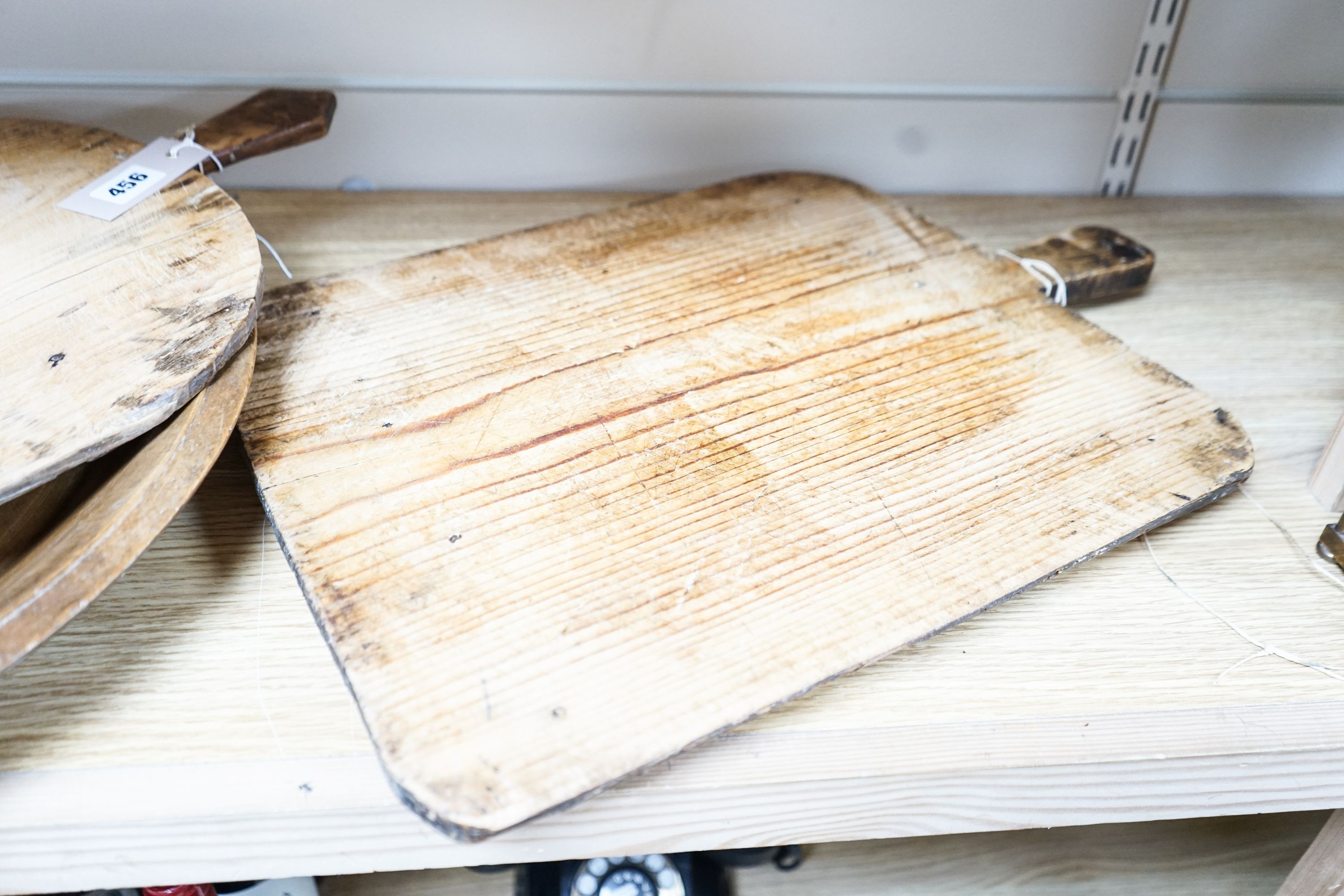A large sycamore dish and two pine chopping boards 44cm